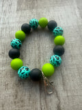 Green, Black and leopard print wristlet
